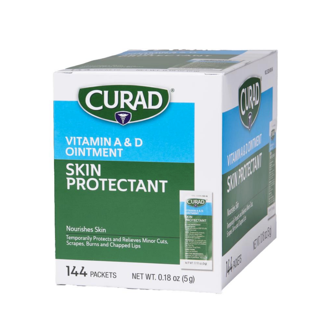 A box of Medline Curad Vitamin A and D Ointment Skin Protectant includes 144 packets in green, blue, and white packaging to temporarily protect and relieve cuts, scrapes, burns, or chapped lips. Contains white petrolatum.